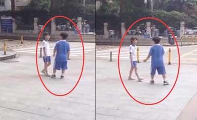 俩小学生当街闹分手：你的辣条是我买的